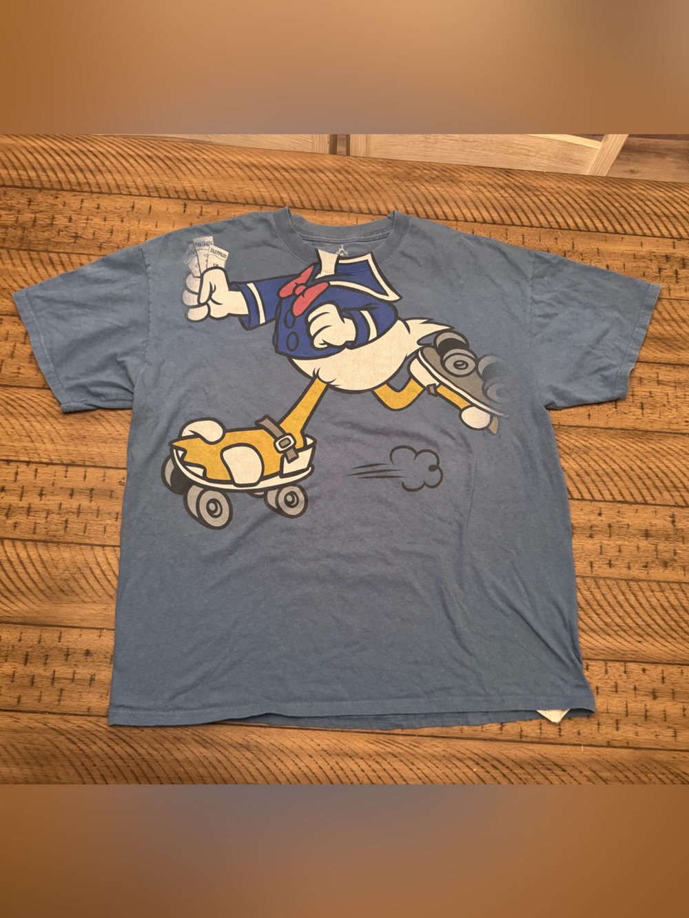 DISNEYLAND RESORT Donald Duck on Roller Skates, Fastpass Tickets in Hand